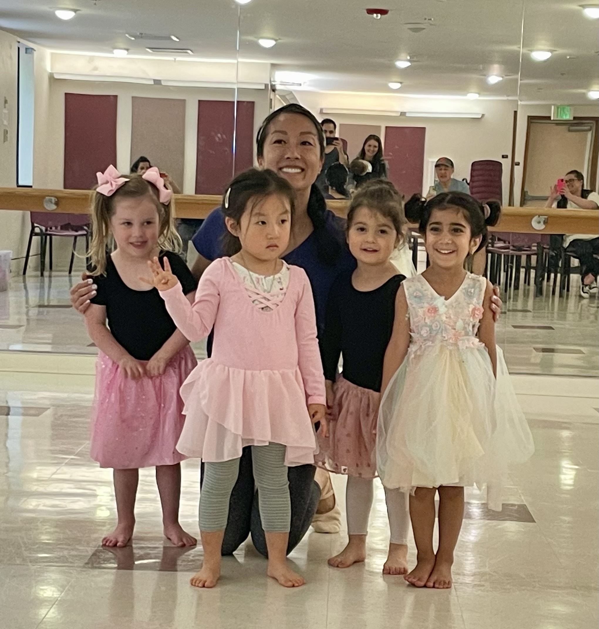 A ballet class poses for a picture